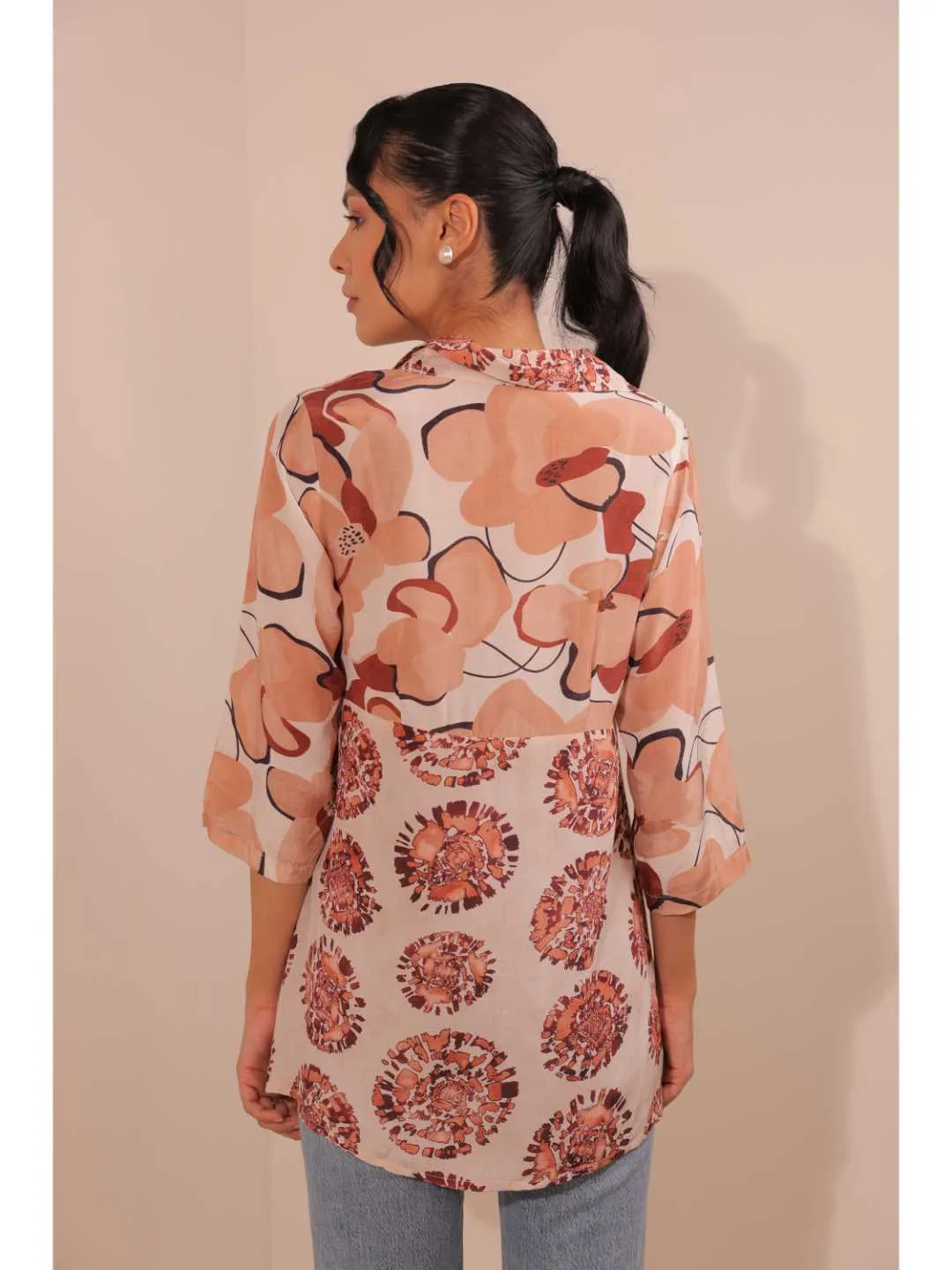 natural crepe abstract printed,  mandarin collar stylised gathered busted top with three fourth sleeve. - White