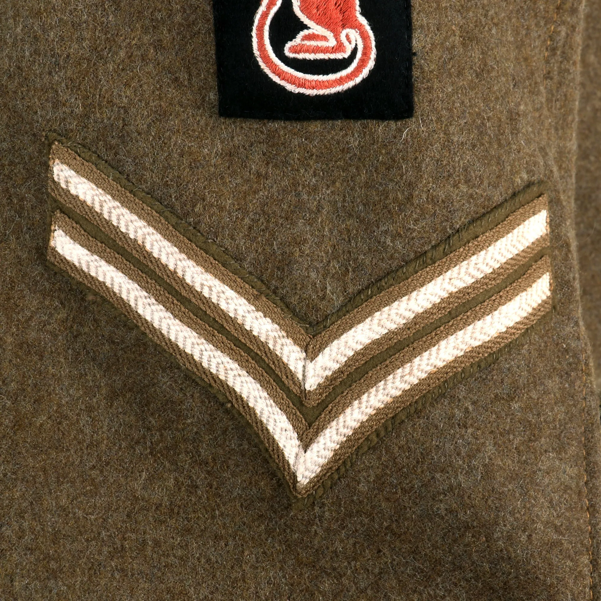 Original British WWII 7th Armored Division “Desert Rats” Corps of Military Police P-40 Battledress Uniform Tunic With Period Applied Insignia - Dated 1945